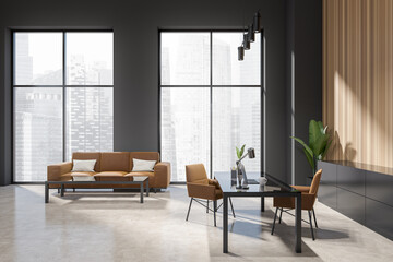 Grey office interior with seats and desk, couch and panoramic window
