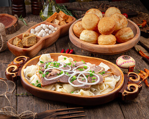 Kazakh national traditional cuisine dishes beshbarmak and baursaqs