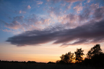 Fototapeta na wymiar Stunning landscape sunset image of Somerset Levels wetlands in England during Spring evening