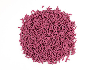 Currant granulated tea on a white background top view. Tea to increase lactation. Dry Granules of...