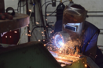 work of a welder, lots of smoke and sparks