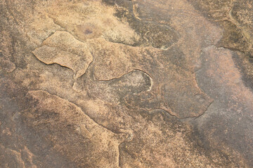 stone background was eroded by the wind creating a beautiful pattern. marble background with text