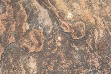 stone background was eroded by the wind creating a beautiful pattern. marble background with text