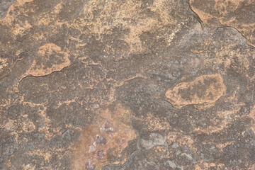 stone background was eroded by the wind creating a beautiful pattern. marble background with text