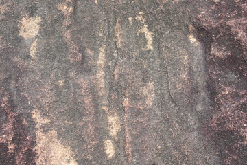 stone background was eroded by the wind creating a beautiful pattern. marble background with text