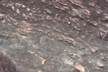 stone background was eroded by the wind creating a beautiful pattern. marble background with text