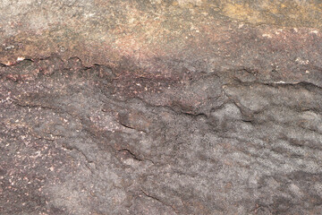 stone background was eroded by the wind creating a beautiful pattern. marble background with text