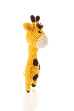 Amigurumi crochet giraffe isolated on white background   