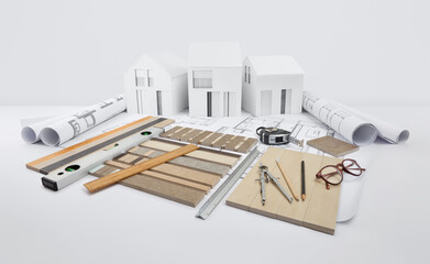 marble samples and tiles with measuring and drawing tools on blueprint with model house, interior design, finishing materials shop, planning, sale and installation for kitchen, bathroom and flooring