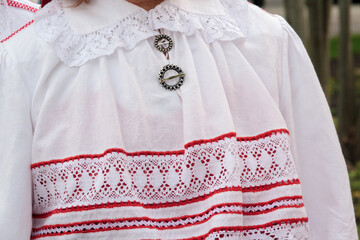 Close-up of a fragment of an Estonian folk costume