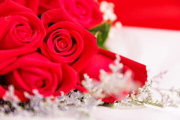 A big, elegance and luxury bouquet made of red roses. Beautiful arrangement colorful bunch.