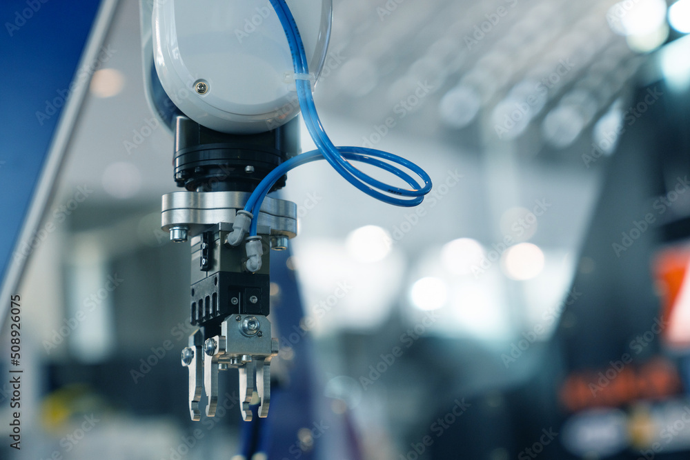 Aufkleber A robotic arm. Automatic robot in a smart factory. Assembly line