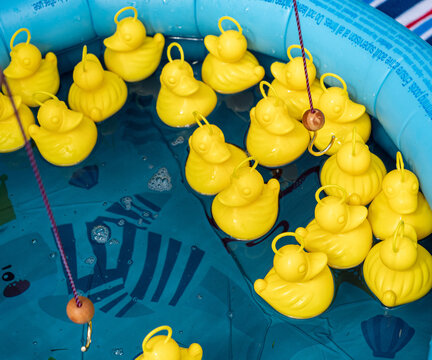 Children's Hook A Duck Game At A Village Fete