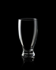 Empty glass of water isolated on black background