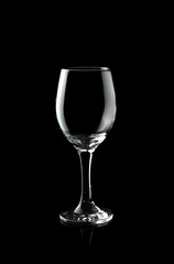 Empty wine glass isolated on black background