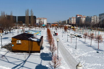 City park, near the shopping center, photo from a high vantage point. Photo of the city park, from a height, in winter.