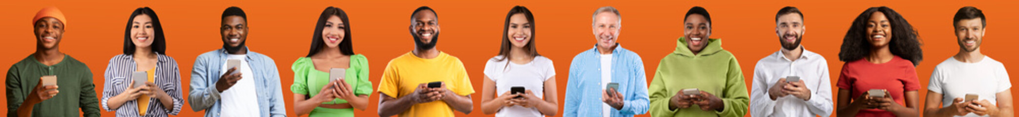 Smiling, happy surprised young and adult multiethnic men and ladies in casual with phone isolated on orange background