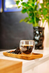 coffee in beauty cosmetic salon. Focus on coffee cup. lounge zone background