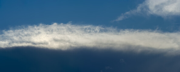 Rain clouds and stratus on blue sky background. - obrazy, fototapety, plakaty