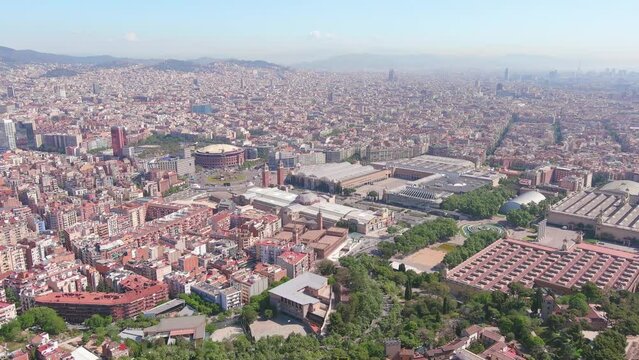Barcelona, Spain: Aerial view of capital city of Catalonia, famous square Plaza Espa&ntilde;a (Pla&ccedil;a d'Espanya) and bullring Arenas de Barcelona, sunny day, blue sky - landscape panorama of Europe from above