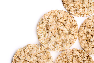 Puffed rice bread isolated on white background. Rice cakes. Round diet crispbreads on a white background. Round shaped cereal bread, healthy food without yeast. 