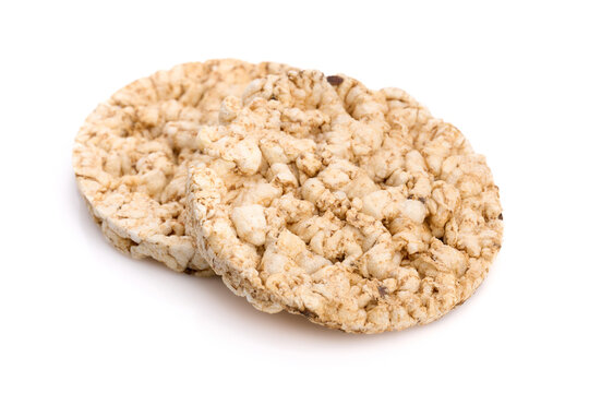 Puffed rice bread isolated on white background. Rice cakes. Round diet crispbreads on a white background. Round shaped cereal bread, healthy food without yeast. 