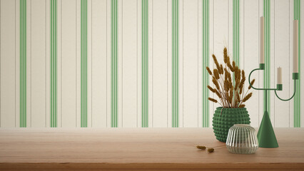Empty interior design concept, wooden table, desk or shelf close up in green tones. Ceramic and glass vases with dry plants, straws. Striped wallpaper with copy space, template