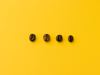 coffee beans on yellow background