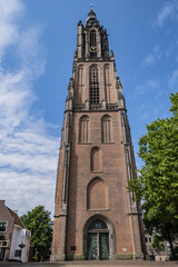 Fototapeta na wymiar Built in the 15th century, 98-meter high Onze Lieve Vrouwetoren (Our Lady tower) or Langejan (Long John) is the third-tallest church tower in the Netherlands. Amersfoort. the Netherlands.
