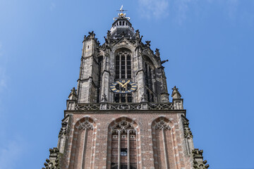 Fototapeta na wymiar Built in the 15th century, 98-meter high Onze Lieve Vrouwetoren (Our Lady tower) or Langejan (Long John) is the third-tallest church tower in the Netherlands. Amersfoort. the Netherlands.