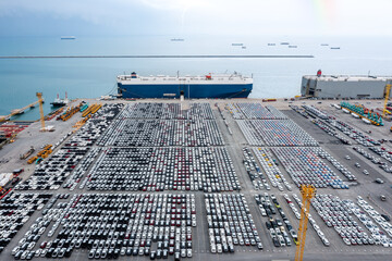 Large RoRo (Roll-on Roll-off) into Commercial dock loading new car product order for sale for...