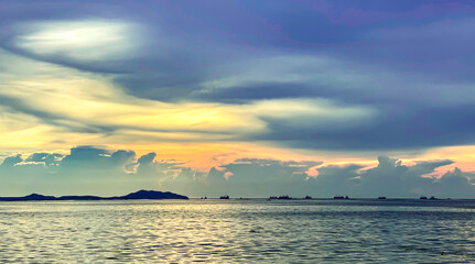 The red clouds at sunset look beautiful in the evening. ocean landscape