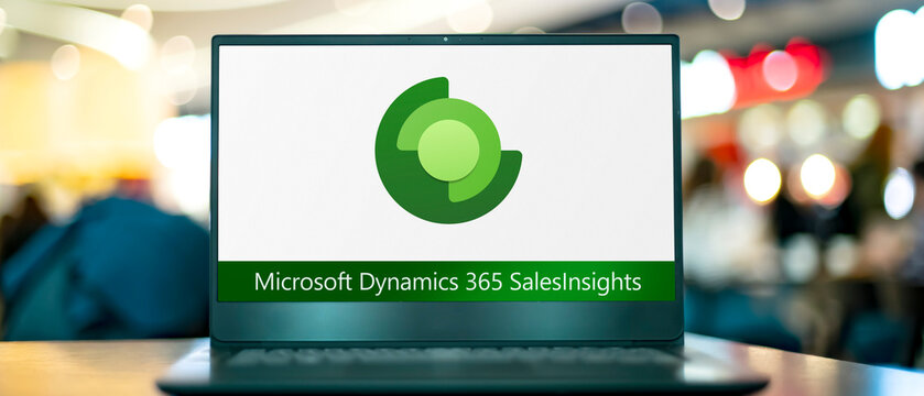 Computer with logo of Microsoft Dynamics 365 Sales Insights