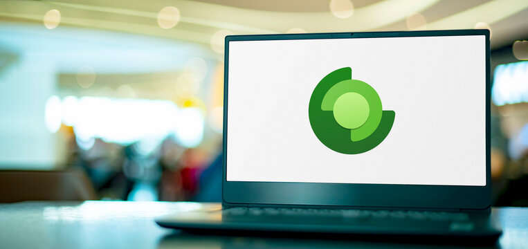 Computer with logo of Microsoft Dynamics 365 Sales Insights