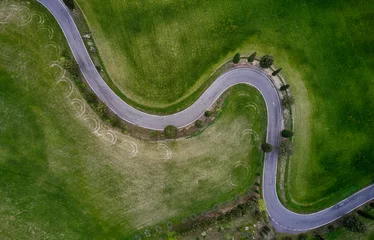Fotobehang Aerial view on the road in Tuscan countryside © yorgen67