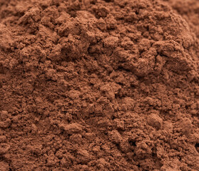 Pile of Cocoa powder isolated on white background. 