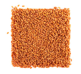 Camelina sativa seeds isolated on white background. Seeds of camelina or false flax. Raw material for the production of camelina oil. Top view.