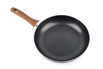 New black pan on a white background. Dishes.