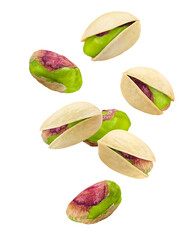 Falling pistachio isolated on white background, clipping path, full depth of field