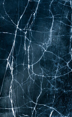 A frozen lake in the field in winter