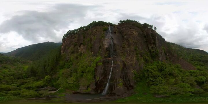 Beautiful waterfall in the rainforest. Aerial view of Bambarakanda Falls, Sri Lanka. 360 panorama VR.