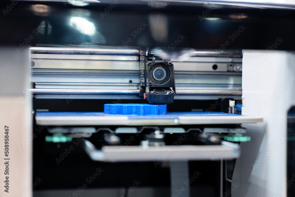 Poster a 3d printer in the laboratory prints a structure from a polymer