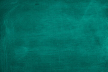 Texture of chalk on blank green blackboard or chalkboard background. School education, dark wall backdrop, template for learning board concept.