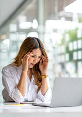 Stressed asian businesswoman having headache at work concept, frustrated dizzy chinese woman...