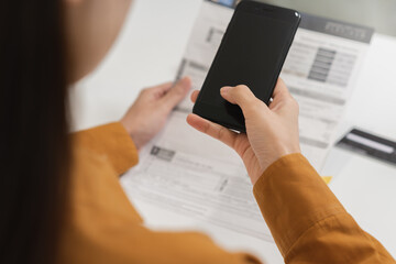 Convenience online internet banking, asian young woman hand in payment bill, spending by scan qr code, use phone, mobile to transfer or pay money of credit card without cash. Technology of financial.