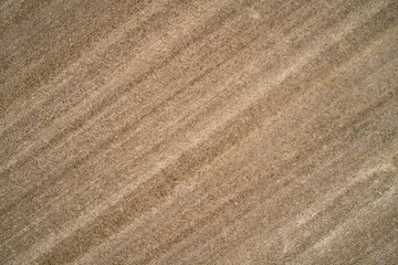 Dry grass top view. Dry grass drone view. Texture dry grass aerial view.