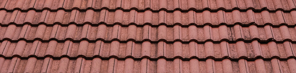 New roof with ceramic tiles, Orange roof tiles - European rounded roof-tiles, Brown terra cotta...