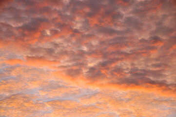 Naklejka na ściany i meble sunset over the clouds