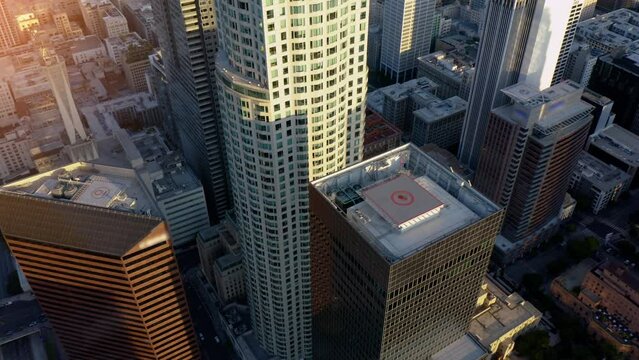 Aerial shot, drone rising showing the skyscrapers of the financial district, downtown of Los Angeles. Top view. Aerial Drone.  High rise skyscrapers downtown Los Angeles