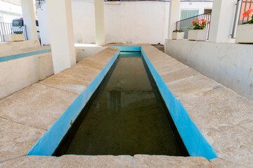 Old public laundry with fresh and crystal clear water